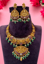 Beautiful kanti necklace with green stone and guttapusalu hangings